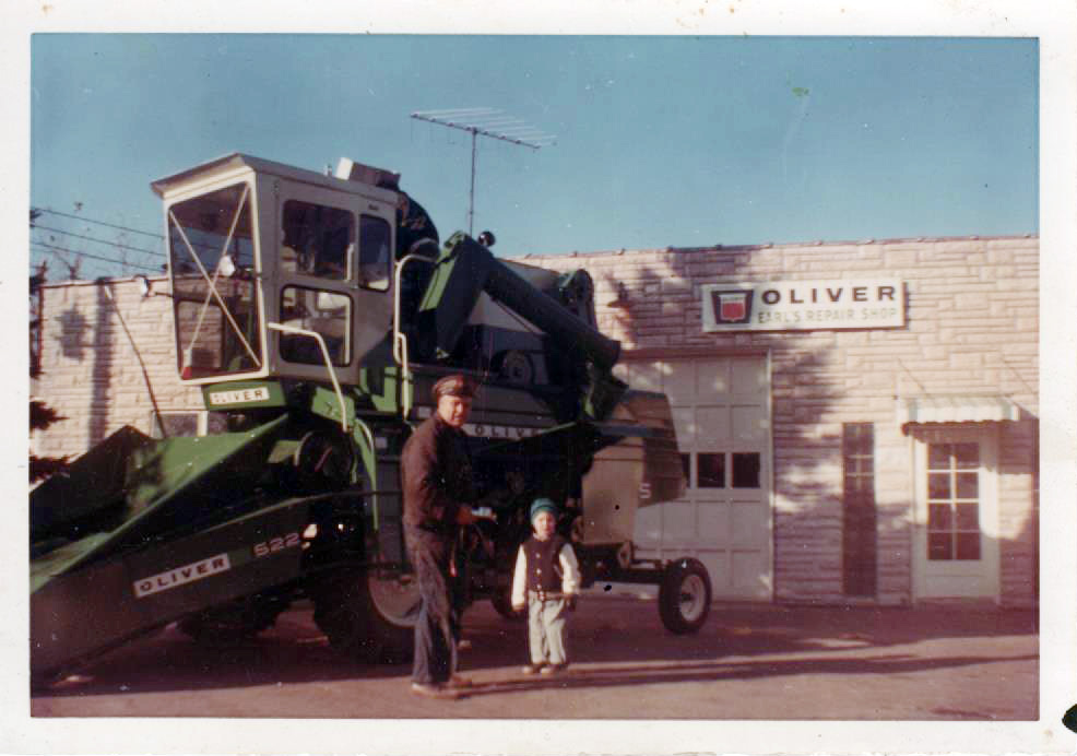 A young Rich and his father, Earl, after unloading a new combine. 