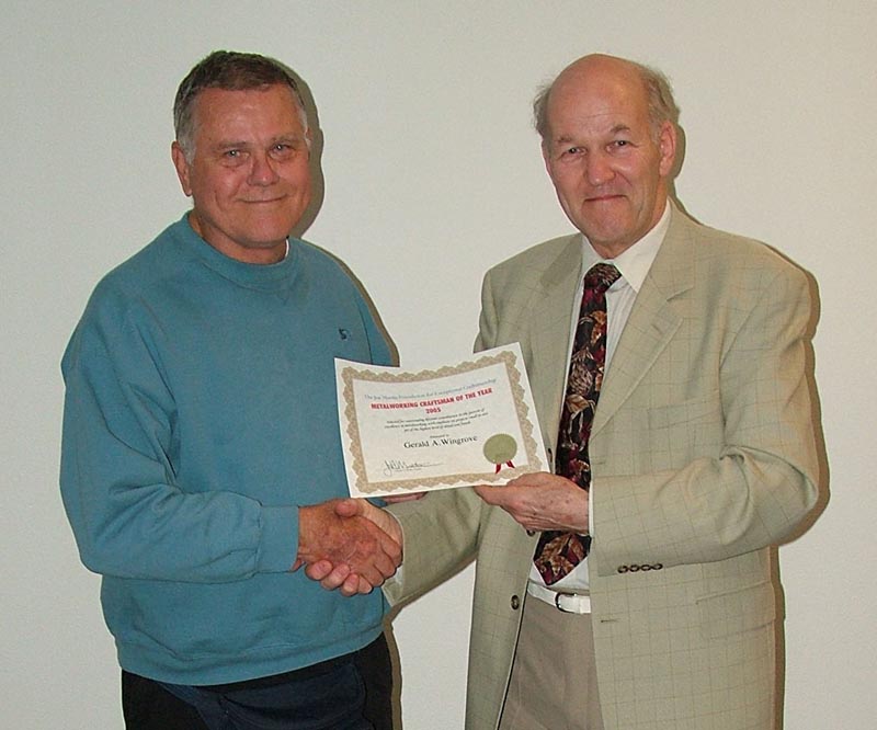 Gerald Wingrove (right) accepts his Craftsman of the Year Award from Joe Martin.