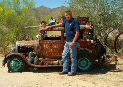 Ernie standing with his Hillbilly Model A