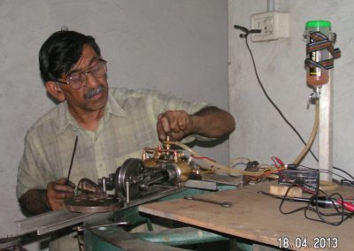 Iqbal working on the Quadricycle.