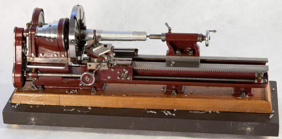 A 1/16 scale model of a belt-driven lathe.