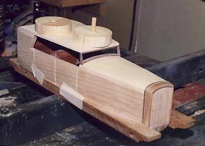 Wooden body for a model car.