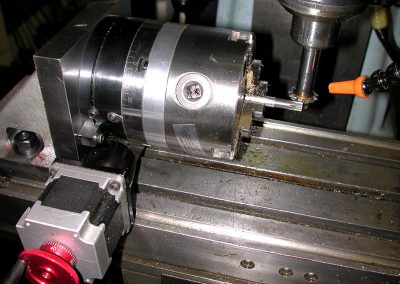 Close-up of the gear cutting operation.