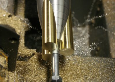 Close-up lathe work with tailstock.
