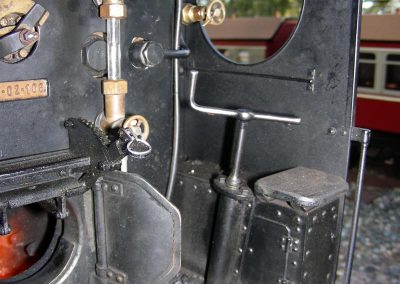 The fireman's seat inside the cab.