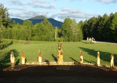 A group of Randy's sculpture outside lodge.