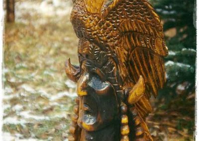 Eagle atop a Native American bust.