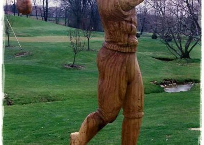 Golfer sculpture on the greens.