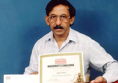 Iqbal with his certificate from 2001 NAMES Expo.
