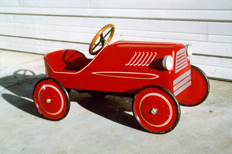 Bill's first pedal car, which was actually made from wood.