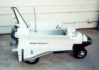 Challenger space shuttle pedal car.