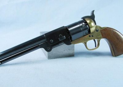 A scaled down Colt Army revolver.