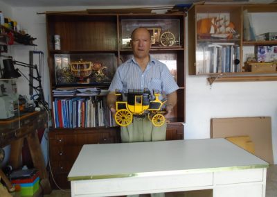 José with a model in his workshop.