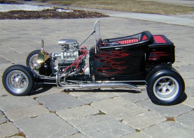 T-Bucket roadster with a Stinger engine.