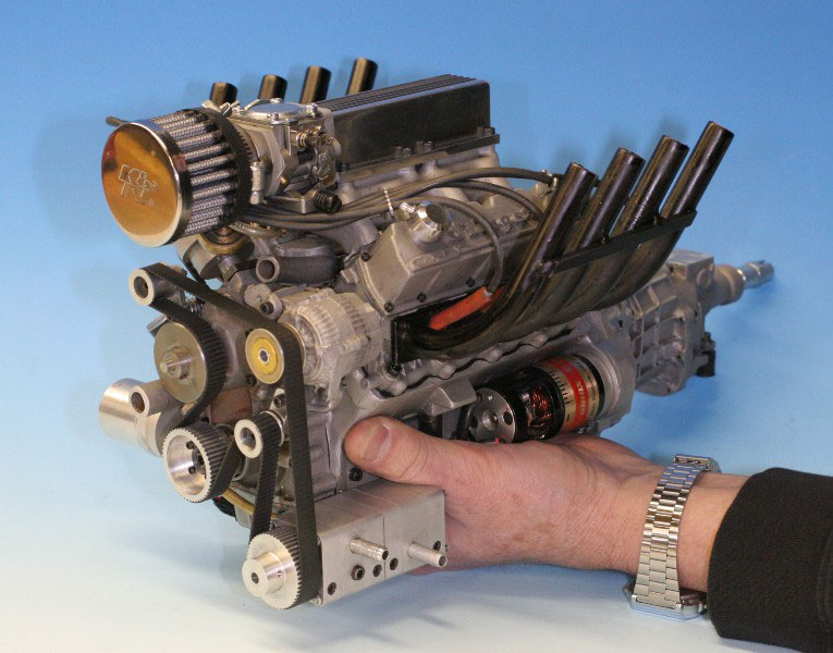 The Stinger 609 engine with hand for size reference. 