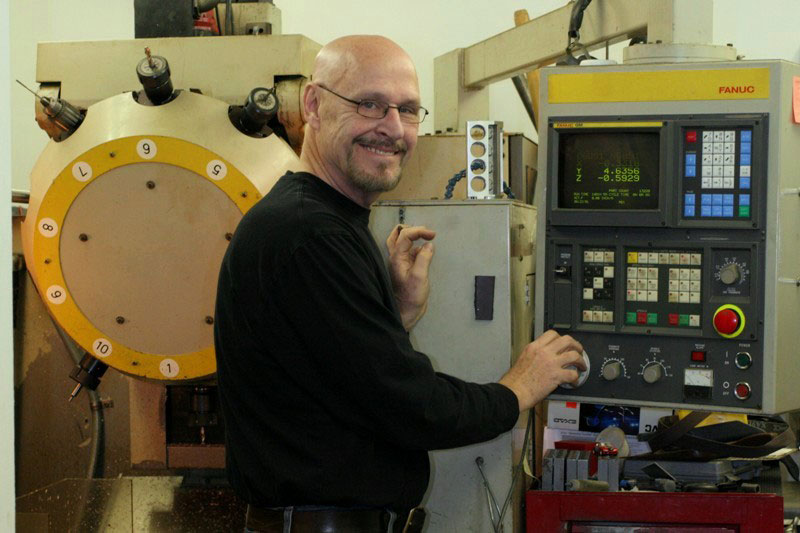 Gary at the CNC Machiniing Center in his shop. 