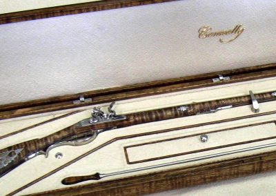 Close view of the rifle in its case.