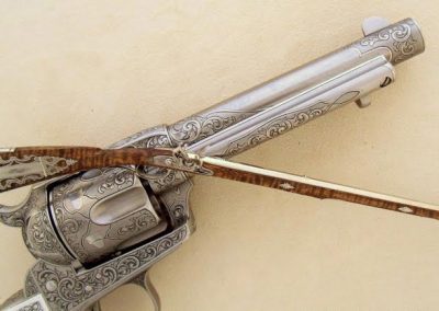 The revolver with the long rifle for size comnparison.