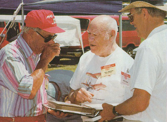 Bill Brown (center) speaking with some friends. 