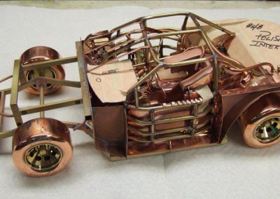 The rolling chassis for Jimmy Johnson's gold car.