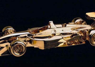 Gil Deferan's gold car award from 2000.