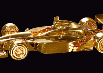 Helio Castorneves' gold car award from 2002.