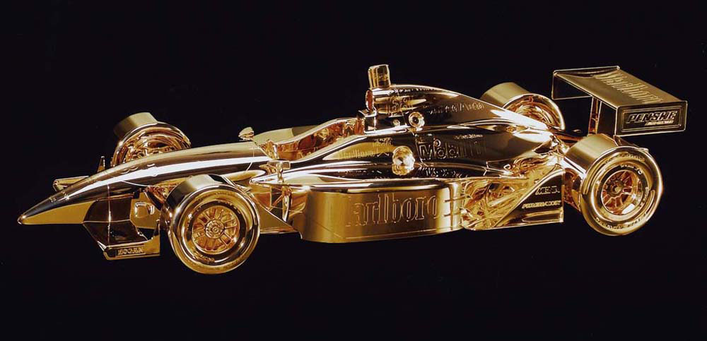 Mike's gold car for Indy 500 winner Helio Castorneves.