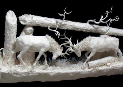 A wildlife sculpture entitled, “Battling Bulls of the Rockies.”
