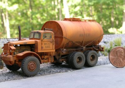 Joe's Mack water truck with penny for scale.