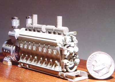 Another look at the Prime Mover engine with dime for scale.