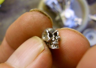A tiny skull pin.