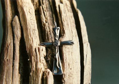 A silver cross made by Bryan.