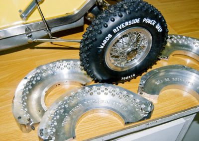 A close look at the knobby tire and molds.