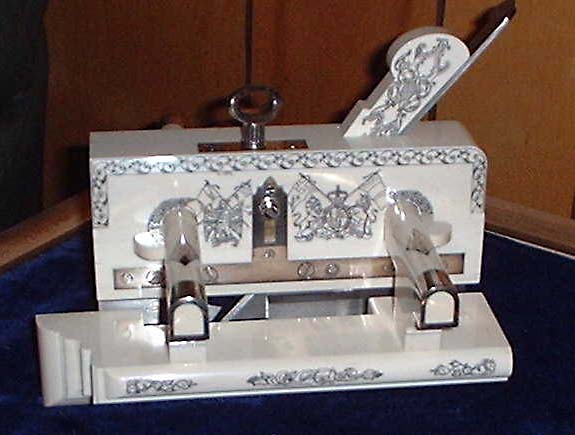 An ornate miniature plow plane made by Paul.