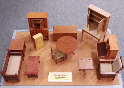 An array of miniature furniture from Al Cushman.