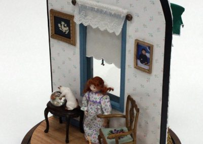 A small model of a child's bedroom.