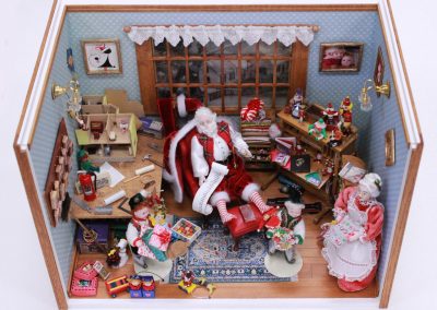 A scale diorama of Santa's workshop.