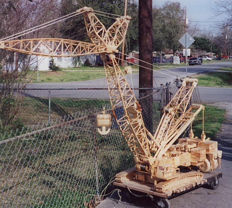 A wooden tracked crane built by Perry.