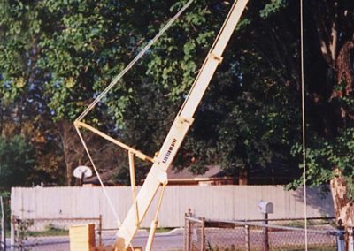 This photo shows the model crane truck with boom extended.