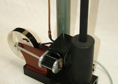 A scale model steam engine with boiler.