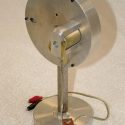 This mechanical stroboscope uses a shutter type aperture to make rapid movement appear to slow down or stand still.