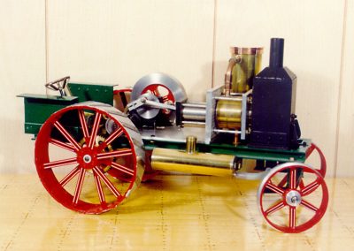 A scale tractor powered by a Stirling engine.