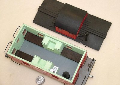 A look inside a scale model caboose.