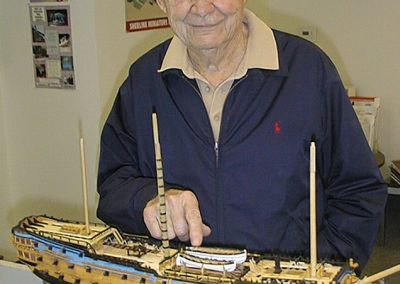 Phil standing behind his model of the HMS Alfred.