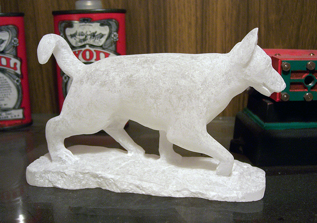 A dog carved out of alabaster.
