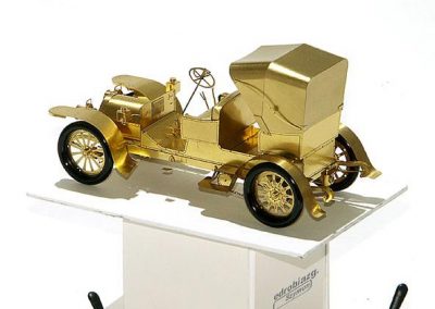 Another look at the tiny brass Mercedes.