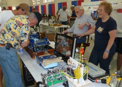 Lou and June Chenot speak with visitors at the Western Engine Model Exhibition.
