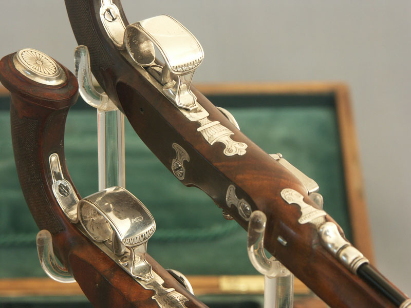 A close-up reveals the sterling silver mounts, all finely engraved.