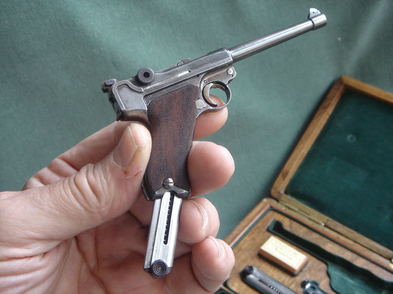 Michel's miniature Navy Luger with the magazine pulled out. 
