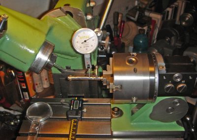 Final dimension control of the bolt with a dial micrometer.